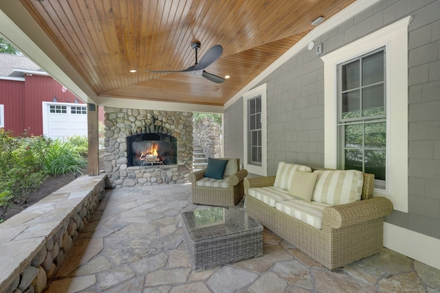 2024 Stratfield Rd, Fairfield, CT 06825 - view of patio with an outdoor living space with a fireplace