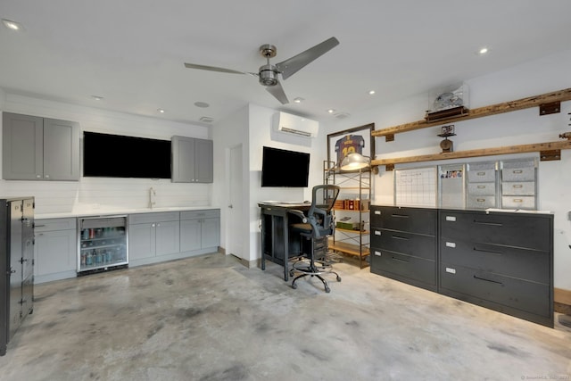 2024 Stratfield Rd, Fairfield, CT 06825 - home office with wine cooler, a wall mounted air conditioner, concrete floors, ceiling fan, and recessed lighting