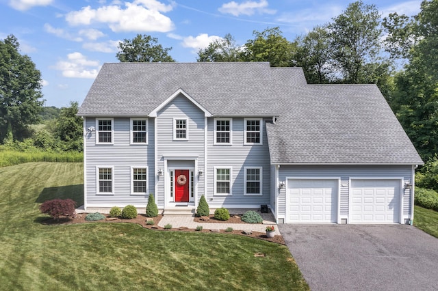 233 Ichabod Rd, Southbury, CT 06488 - colonial inspired home featuring an attached garage, driveway, a front lawn, and a shingled roof