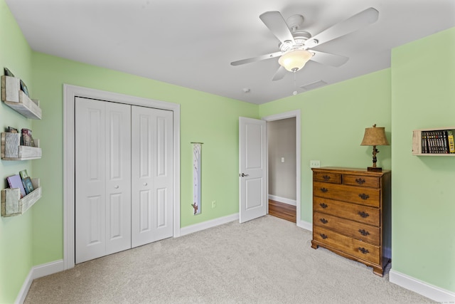 233 Ichabod Rd, Southbury, CT 06488 - bedroom with carpet floors, a closet, and a ceiling fan