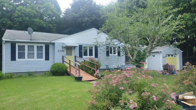 234 Vergason Ave, Norwich, CT 06360 - single story home featuring a front lawn, a garage, roof with shingles, and an outbuilding