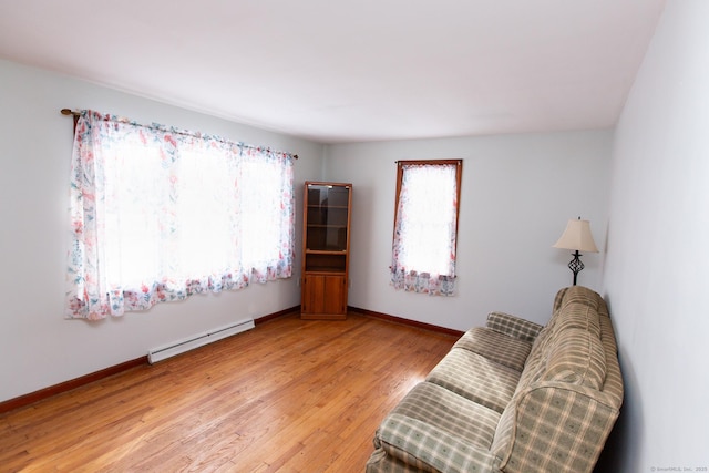 234 Vergason Ave, Norwich, CT 06360 - sitting room featuring baseboard heating and light wood-style flooring