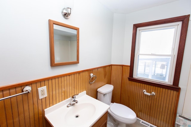 234 Vergason Ave, Norwich, CT 06360 - bathroom featuring a wainscoted wall and vanity