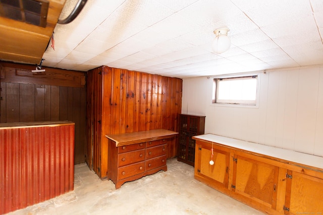 234 Vergason Ave, Norwich, CT 06360 - basement featuring wooden walls and a dry bar