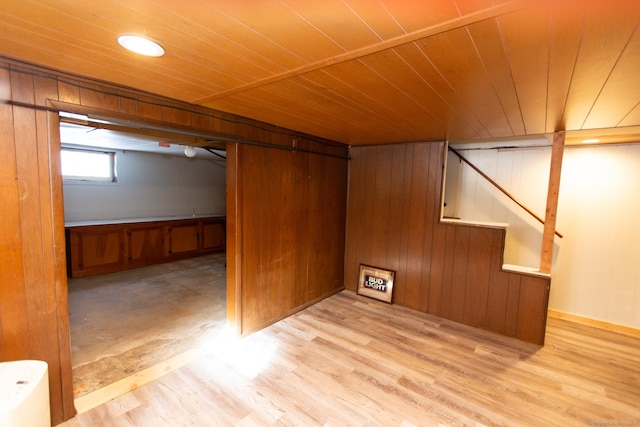 234 Vergason Ave, Norwich, CT 06360 - basement with wooden ceiling, wood walls, wood finished floors, and stairs