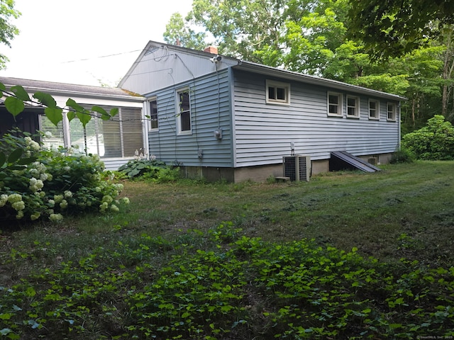 234 Vergason Ave, Norwich, CT 06360 - view of side of property with a central AC unit