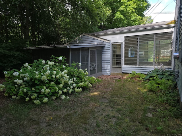 234 Vergason Ave, Norwich, CT 06360 - back of house featuring a sunroom