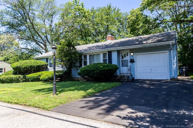 136 Chatham St, Hartford, CT 06112 - single story home featuring an attached garage, a front yard, driveway, a chimney, and entry steps