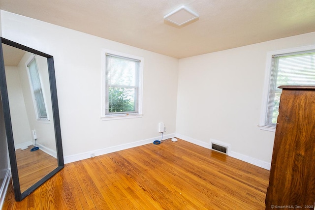 136 Chatham St, Hartford, CT 06112 - unfurnished room with plenty of natural light and light wood finished floors