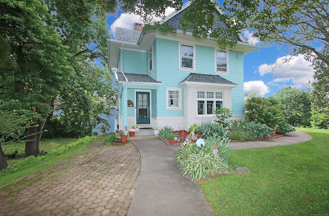 1 Best View Rd, Waterford, CT 06375 - view of front facade featuring a chimney, a shingled roof, and a front yard