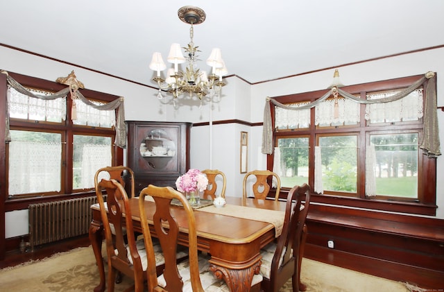 1 Best View Rd, Waterford, CT 06375 - dining area featuring a chandelier, radiator heating unit, ornamental molding, and plenty of natural light
