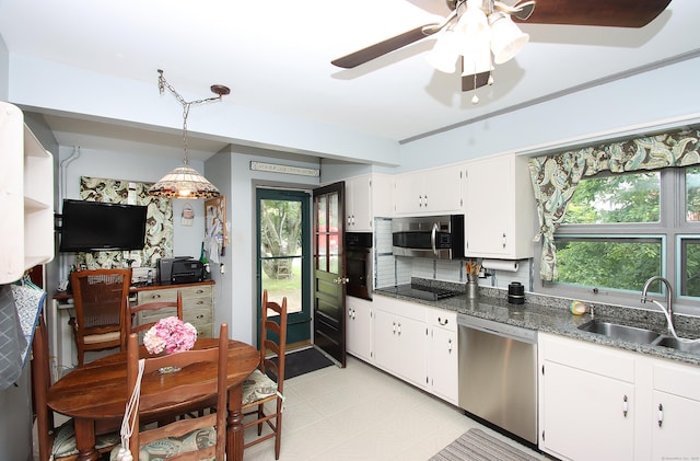 1 Best View Rd, Waterford, CT 06375 - kitchen with black appliances, backsplash, white cabinetry, hanging light fixtures, and a ceiling fan