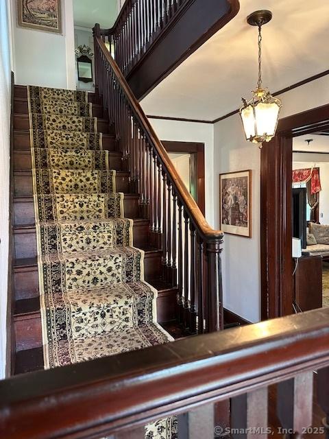 1 Best View Rd, Waterford, CT 06375 - staircase featuring a chandelier