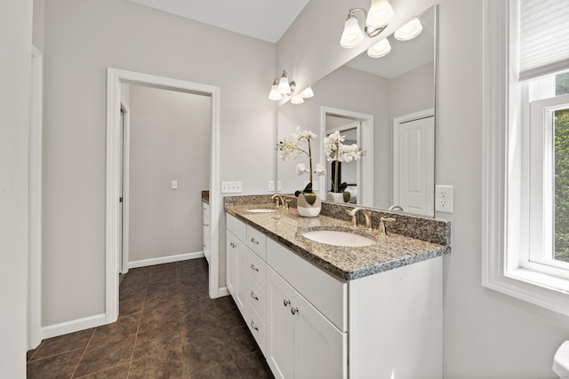 31 Old Oak Ct, Southington, CT 06489 - full bathroom featuring double vanity and tile patterned flooring
