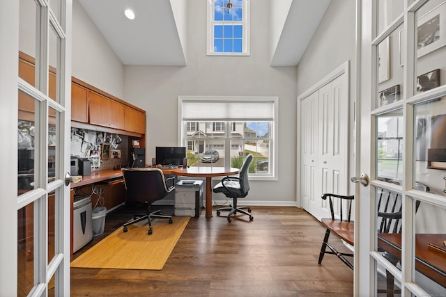 31 Old Oak Ct, Southington, CT 06489 - office area with a high ceiling, wood finished floors, french doors, and built in desk
