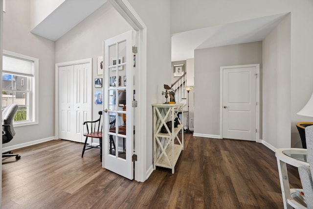 31 Old Oak Ct, Southington, CT 06489 - foyer with dark wood finished floors and stairway