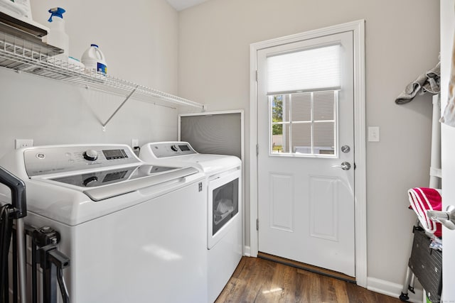 31 Old Oak Ct, Southington, CT 06489 - laundry room with washer and clothes dryer and dark wood-type flooring