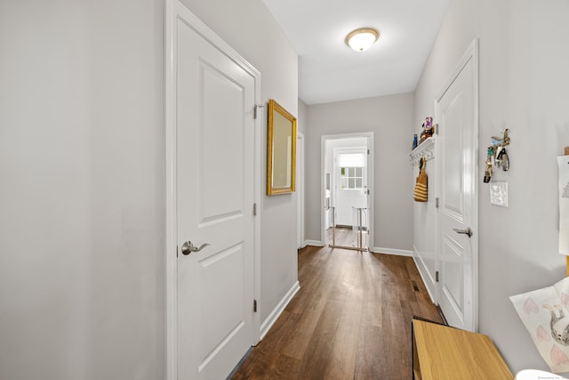 31 Old Oak Ct, Southington, CT 06489 - hallway featuring dark wood-type flooring and baseboards