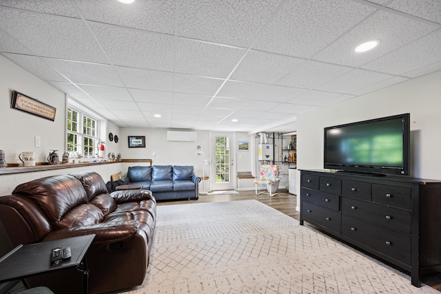 31 Old Oak Ct, Southington, CT 06489 - living room featuring a wall mounted air conditioner, wood finished floors, a paneled ceiling, and recessed lighting