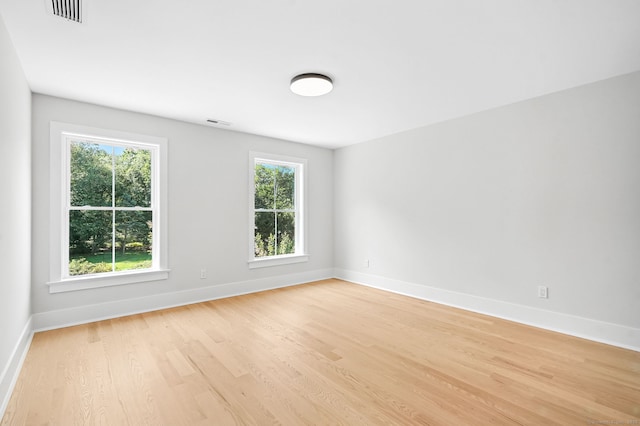 28 Pin Oak Ct, Westport, CT 06880 - unfurnished room with light wood finished floors and plenty of natural light