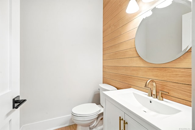 28 Pin Oak Ct, Westport, CT 06880 - bathroom with vanity and wood walls