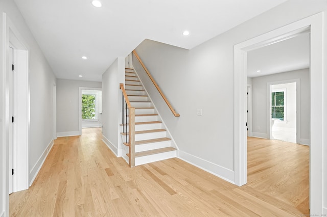 28 Pin Oak Ct, Westport, CT 06880 - staircase featuring wood finished floors and recessed lighting