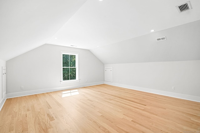 28 Pin Oak Ct, Westport, CT 06880 - additional living space with vaulted ceiling and light wood-style flooring