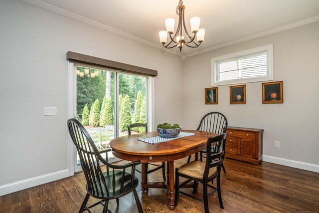 21 Hendricks Ln, Simsbury, CT 06070 - dining room featuring a chandelier, ornamental molding, and dark wood-type flooring