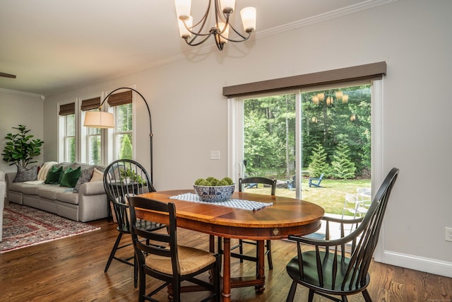 21 Hendricks Ln, Simsbury, CT 06070 - dining area featuring wood finished floors, ornamental molding, and a chandelier