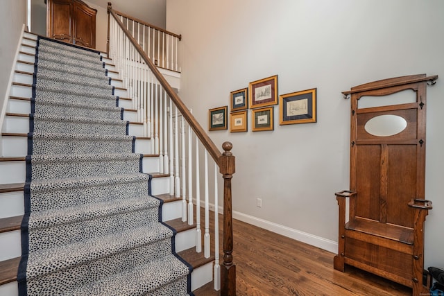 21 Hendricks Ln, Simsbury, CT 06070 - staircase featuring wood finished floors and baseboards