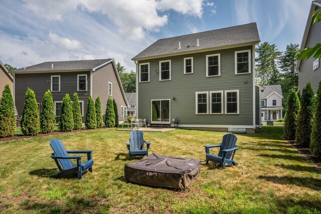 21 Hendricks Ln, Simsbury, CT 06070 - rear view of house featuring a fire pit and a yard