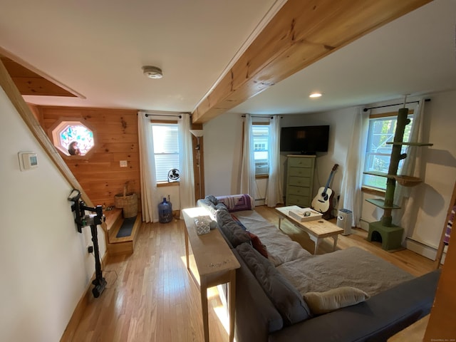 28 Union St, Plymouth, CT 06786 - living area featuring light wood finished floors, wood walls, a baseboard radiator, and baseboard heating