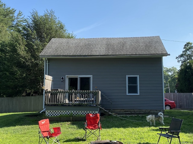 28 Union St, Plymouth, CT 06786 - back of property with a wooden deck and roof with shingles