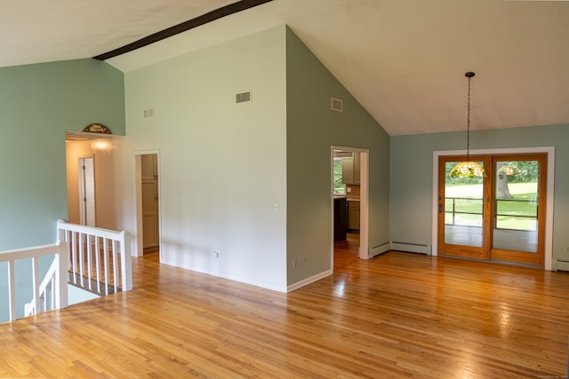 472 Saw Mill Rd, Guilford, CT 06437 - empty room featuring high vaulted ceiling, light wood-style flooring, and a baseboard radiator
