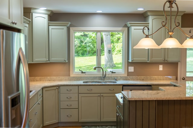472 Saw Mill Rd, Guilford, CT 06437 - kitchen with stainless steel fridge with ice dispenser, pendant lighting, and light stone counters