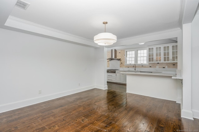 254 W Ave, Darien, CT 06820 - unfurnished living room featuring ornamental molding and dark wood-style floors