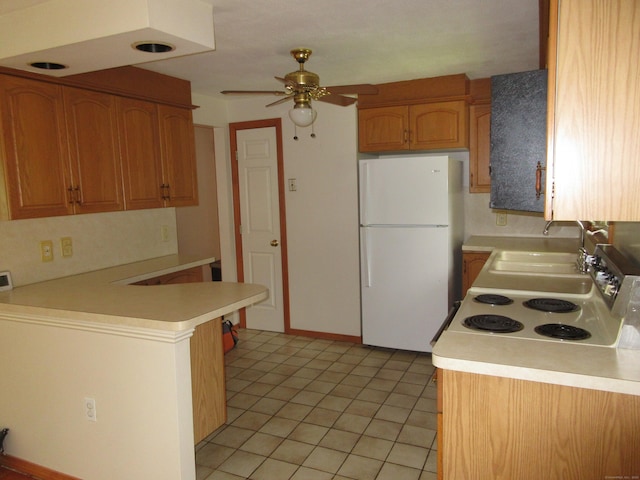 11 Ledgewood Dr, Ledyard, CT 06335 - kitchen featuring white appliances, ceiling fan, a peninsula, light countertops, and light tile patterned flooring