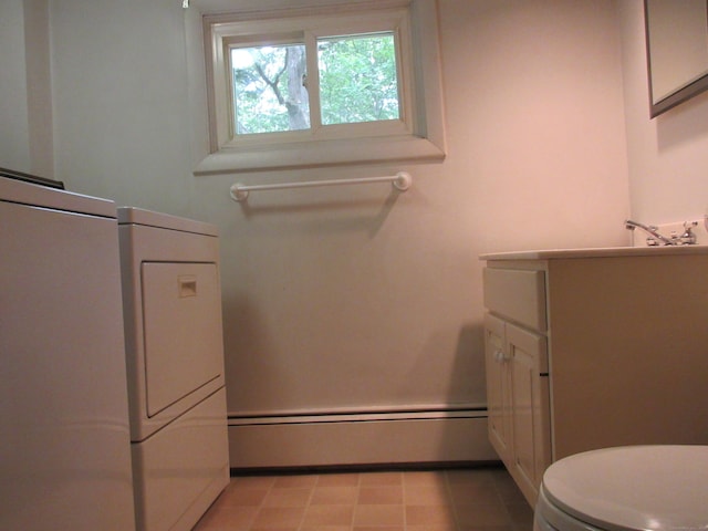 11 Ledgewood Dr, Ledyard, CT 06335 - bathroom with a baseboard heating unit and vanity