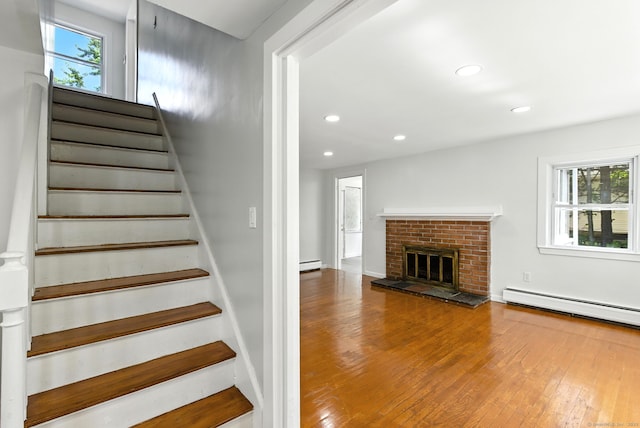 780 Park Ave, Windsor, CT 06095 - stairs with wood-type flooring, plenty of natural light, recessed lighting, and a fireplace