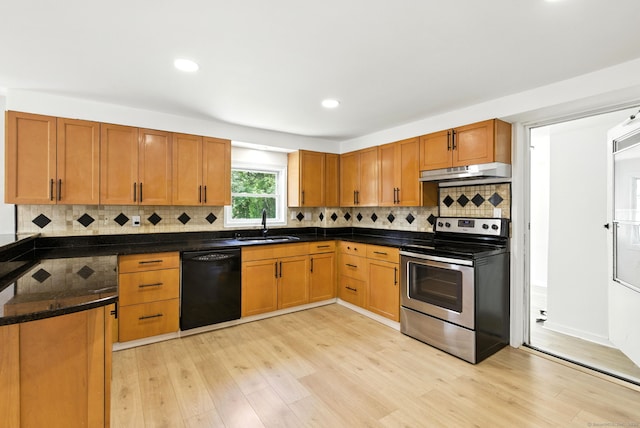 780 Park Ave, Windsor, CT 06095 - kitchen with black dishwasher, stainless steel electric stove, under cabinet range hood, light wood finished floors, and tasteful backsplash