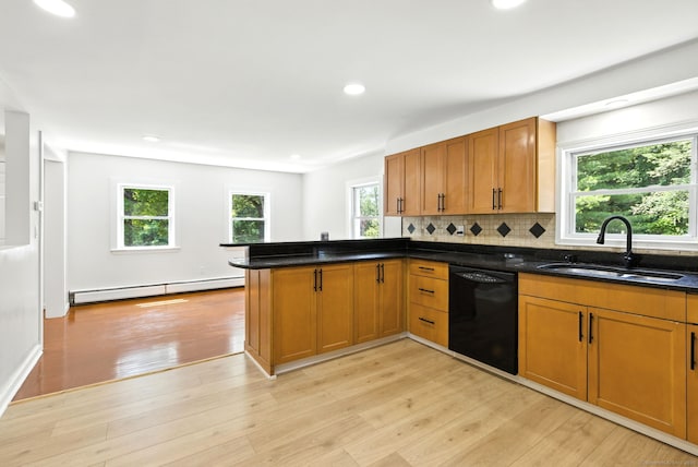 780 Park Ave, Windsor, CT 06095 - kitchen featuring a baseboard heating unit, black dishwasher, a peninsula, decorative backsplash, and brown cabinets