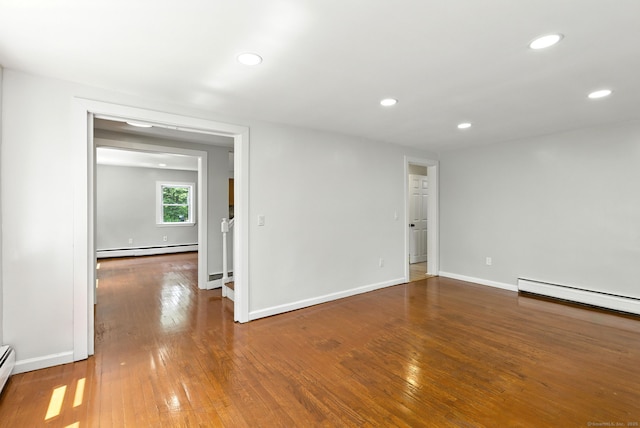 780 Park Ave, Windsor, CT 06095 - unfurnished room featuring a baseboard radiator, hardwood / wood-style flooring, and recessed lighting
