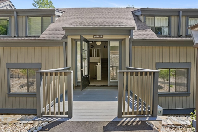 241 Heritage Vlg Unit C, Southbury, CT 06488 - entrance to property with roof with shingles and a deck