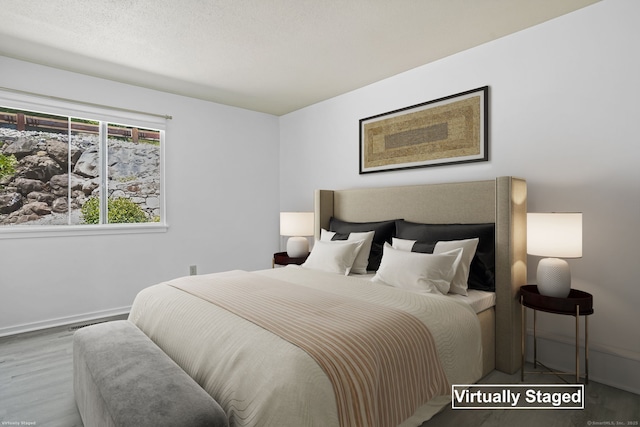 241 Heritage Vlg Unit C, Southbury, CT 06488 - bedroom with wood finished floors and baseboards