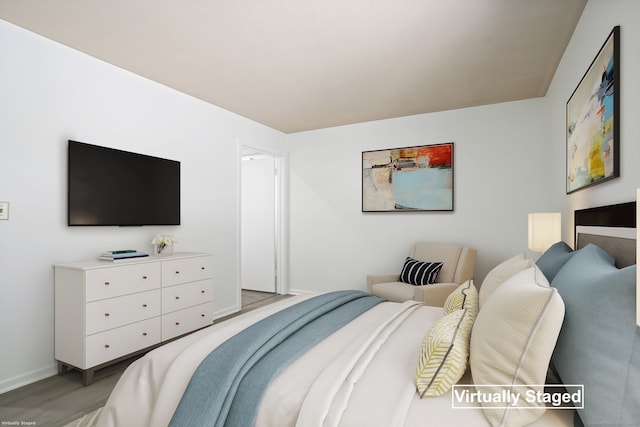 241 Heritage Vlg Unit C, Southbury, CT 06488 - bedroom with baseboards and light wood-type flooring