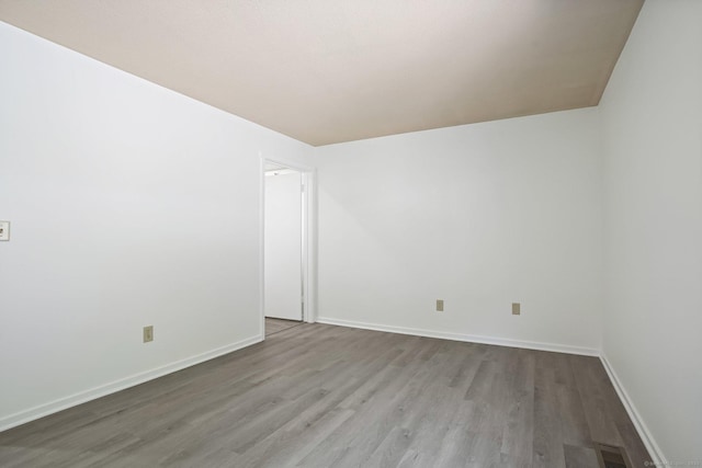 241 Heritage Vlg Unit C, Southbury, CT 06488 - empty room with wood finished floors