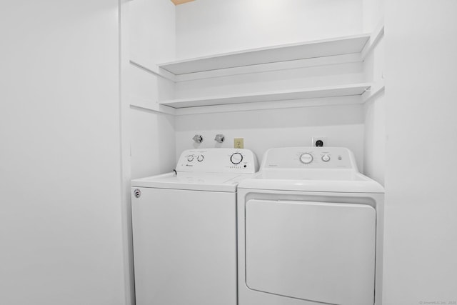 241 Heritage Vlg Unit C, Southbury, CT 06488 - laundry area featuring washing machine and clothes dryer