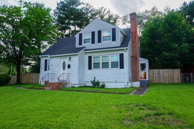 381 Oak St, East Hartford, CT 06118 - view of front facade featuring a chimney and roof with shingles