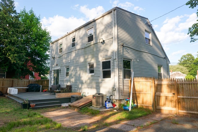 381 Oak St, East Hartford, CT 06118 - back of property with a wooden deck