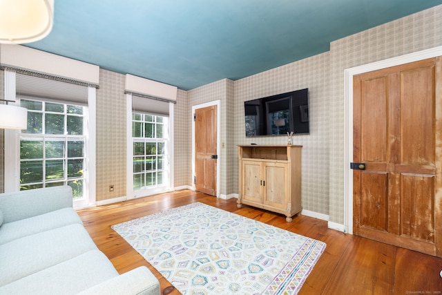 101 Tallmadge Ln, Litchfield, CT 06759 - living area featuring wallpapered walls and hardwood / wood-style flooring